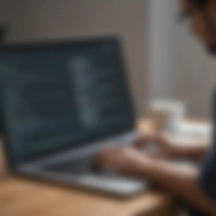 An employee using a leave management software on a laptop